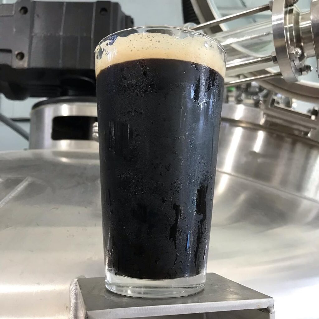 Image of a Milk Stout in a beer glass.