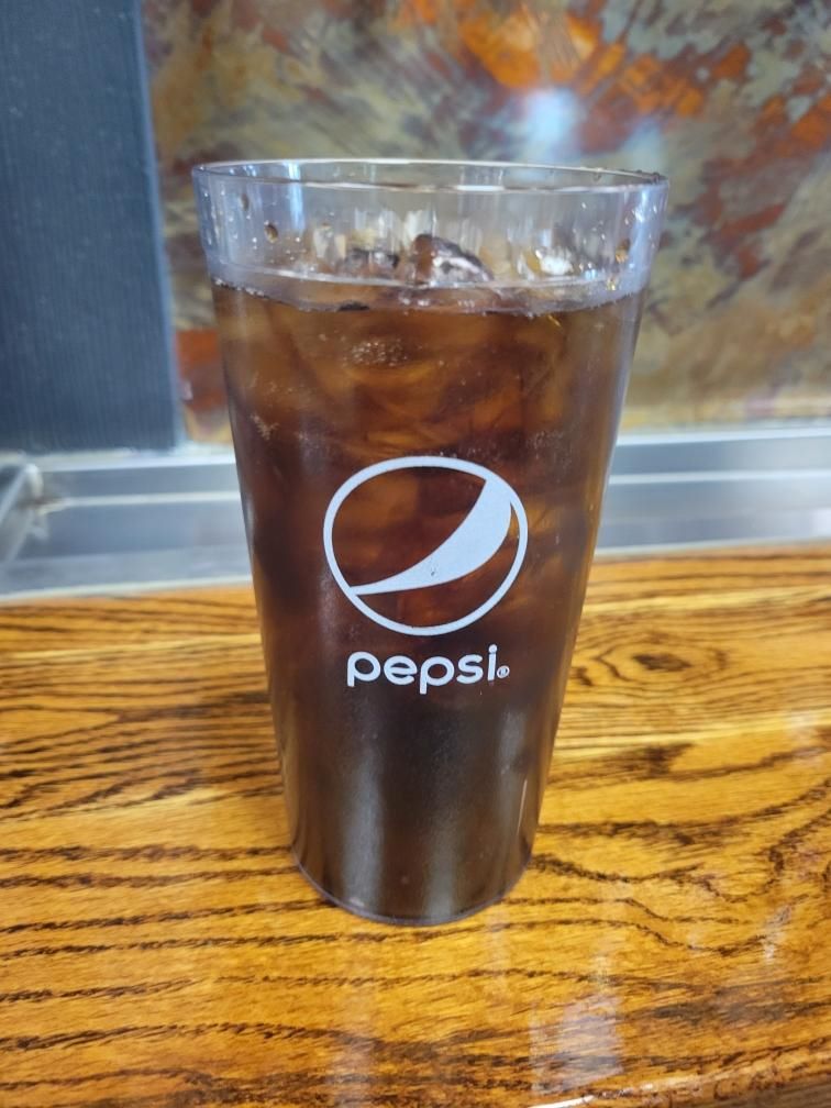 Image of a glass of Pepsi.